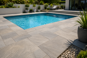 Indian sandstone paving slabs installed around a pool surround