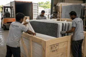 Wooden export crates being loaded with natural stone slabs at Nirvan Exports, Udaipur